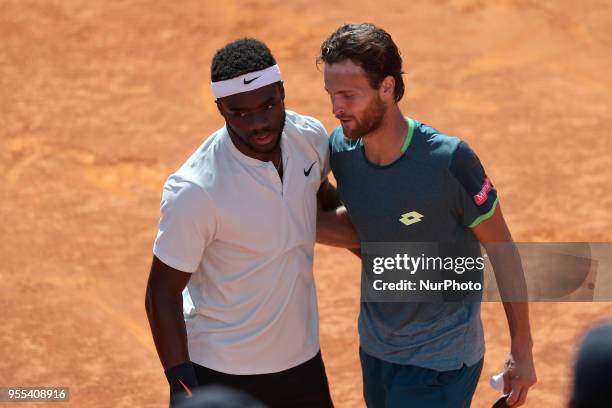 Joao Sousa of Portugal hugs Frances Tiafoe of US after winning the Millennium Estoril Open ATP 250 tennis tournament final, at the Clube de Tenis do...