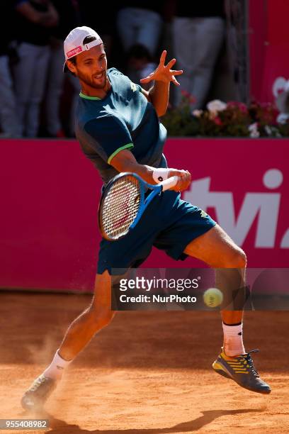 Portuguese tennis player Joao Sousa returns a ball to North-American tennis player Frances Tiafoe during their Millennium Estoril Open ATP Singles...