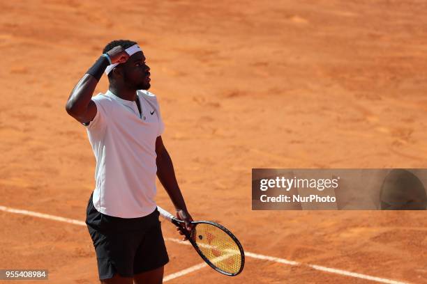 Frances Tiafoe of US celebrates a point over Joao Sousa of Portugal during the Millennium Estoril Open ATP 250 tennis tournament final, at the Clube...