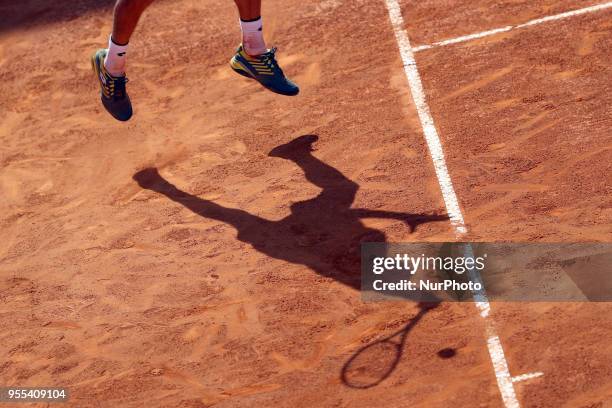 Joao Sousa of Portugal returns a ball to Frances Tiafoe of US during the Millennium Estoril Open ATP 250 tennis tournament final, at the Clube de...