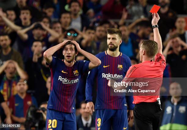 Alejandro Jose Hernandez Hernandez shows a red card to Sergi Roberto of Barcelona as he is sent off during the La Liga match between Barcelona and...