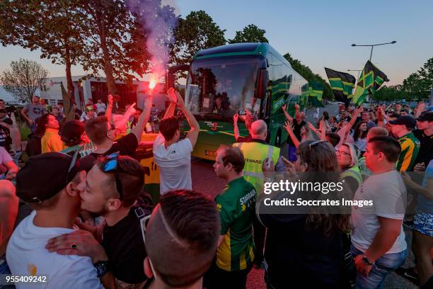 Players bus of ADO Den Haag arrives at the stadium after the victory and qualification for the play offs during the Dutch Eredivisie match between...