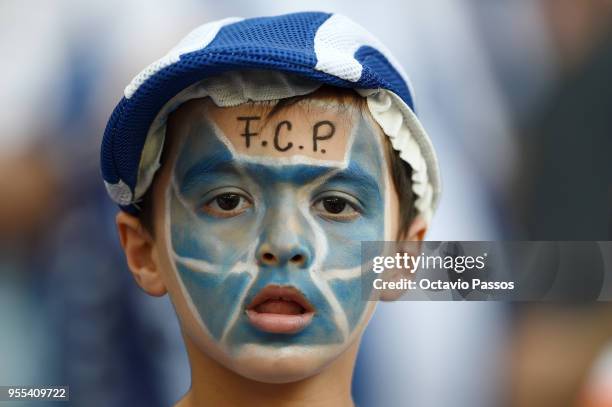 Young fan of FC Porto during the Primeira Liga match between FC Porto and Feirense at Estadio do Dragao on May 6, 2018 in Porto, Portugal.