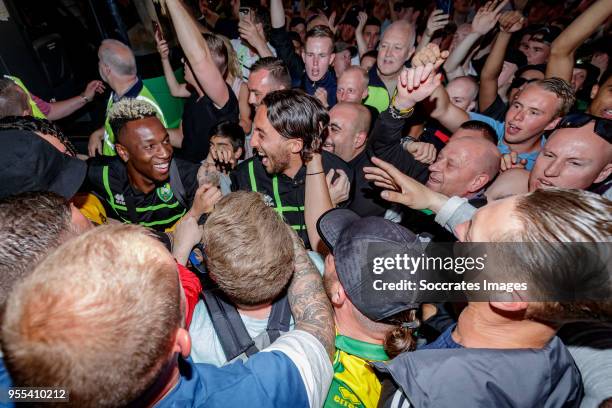 Sheraldo Becker of ADO Den Haag, Nasser El Khayati of ADO Den Haag arrive at the stadium after the victory and qualification for the play offs during...