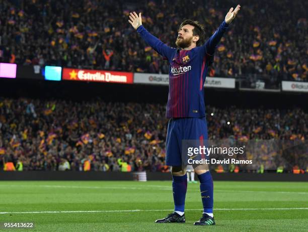 Lionel Messi of Barcelona celebrates after scoring his sides second goal during the La Liga match between Barcelona and Real Madrid at Camp Nou on...