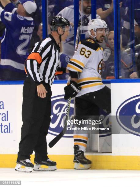 Brad Marchand of the Boston Bruins heads to the penalty box during Game Five of the Eastern Conference Second Round against the Tampa Bay Lightning...