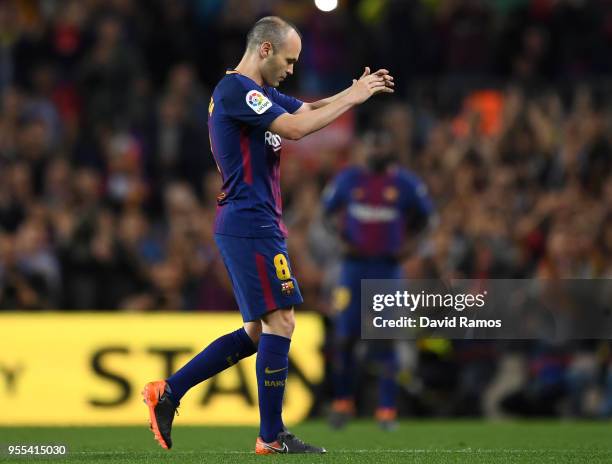 Andres Iniesta of Barcelona applauds the crowd as he is substituted in his final El Clasico during the La Liga match between Barcelona and Real...