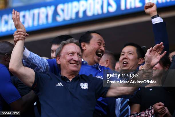 Cardiff City manager Neil Warnock celebrates with club owner Vincent Tan during the Sky Bet Championship match between Cardiff City and Reading at...