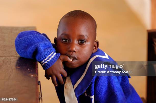 Jeune garçon en classe, Jos, Nigéria.