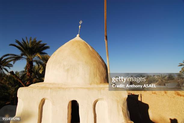 Old white mosque made of mud brick , Ghadames, Libya.