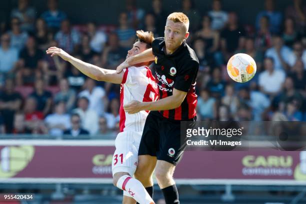 Nico Tagliafico of Ajax, Mike van Duinen of Excelsior during the Dutch Eredivisie match between sbv Excelsior Rotterdam and Ajax Amsterdam at Van...