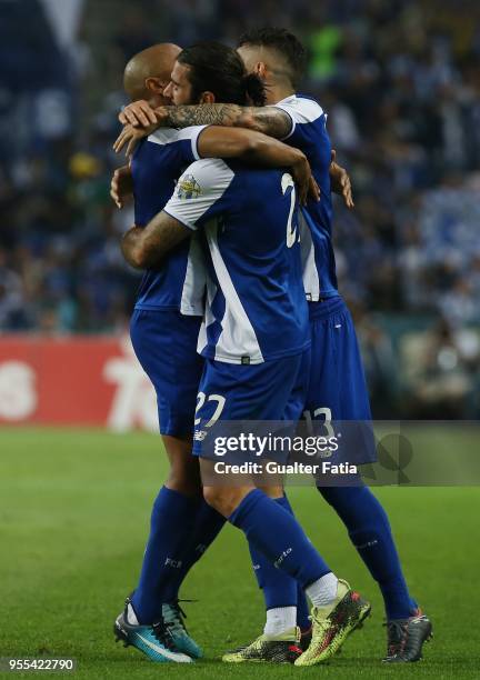Porto midfielder Sergio Oliveira from Portugal celebrates with teammates after scoring a goal during the Primeira Liga match between FC Porto and CD...
