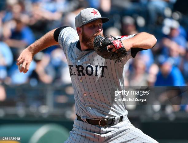 Buck Farmer of the Detroit Tigers throws in the eighth inning against the Kansas City Royals at Kauffman Stadium on May 6, 2018 in Kansas City,...