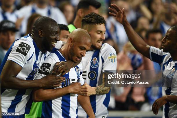 Moussa Marega celebrates with Yacine Brahimi of FC Porto after scores the second goal during the Primeira Liga match between FC Porto and Feirense at...