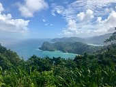 Beautiful Maracas Lookout Point with lush greenery and turquoise ocean on the Caribbean island of Trinidad & Tobago