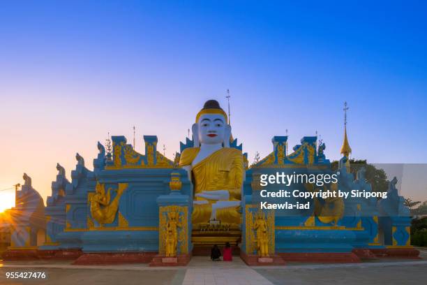 a big sitting buddha statue near inle lake, myanmar. - copyright by siripong kaewla iad stock pictures, royalty-free photos & images