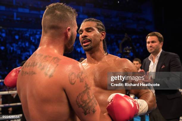 Tony Bellew and David Haye embrace after Bellew wins the Heavyweight contest between Tony Bellew and David Haye at The O2 Arena on May 5, 2018 in...
