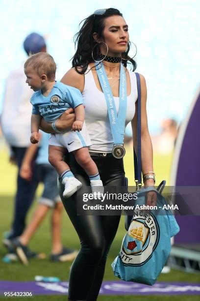 Annie Kilner the wife of Kyle Walker of Manchester City wearing the championship medal during the championship celebrations after the Premier League...