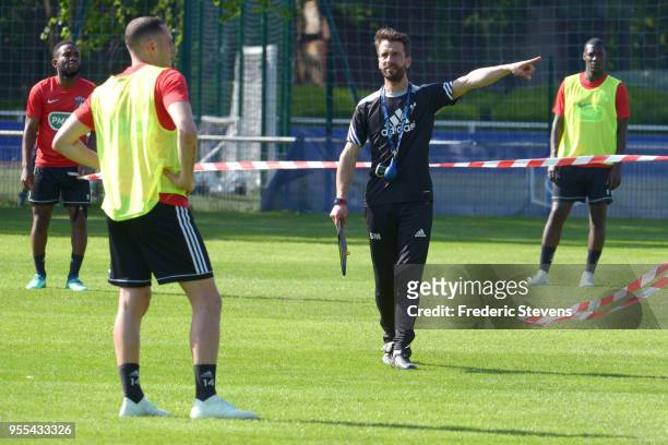 Stephane Masala head coach of the team of Herbiers gives his advice during the first training session at the National Football Center on May 6, 2018...