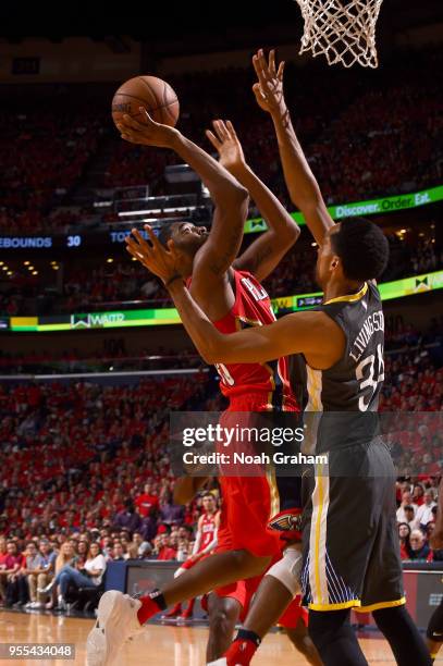 Ian Clark of the New Orleans Pelicans goes to the basket against the Golden State Warriors during Game Four of the Western Conference Semifinals of...