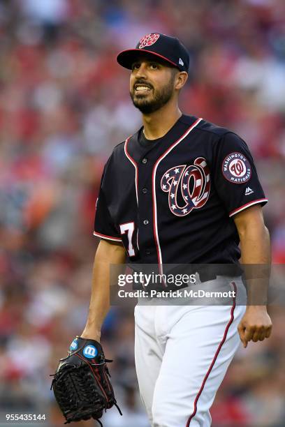 Starting pitcher Gio Gonzalez of the Washington Nationals reacts as he walks off the field after the top of the first inning against the Philadelphia...