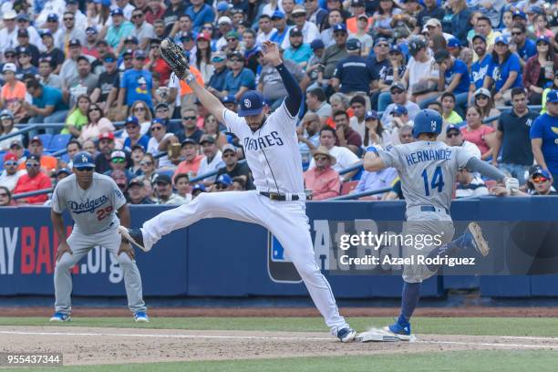 Center fielder Enrique Hernandez of Los Angeles Dodgers gets outed oi the third inning during the MLB game against the San Diego Padres at Estadio de...