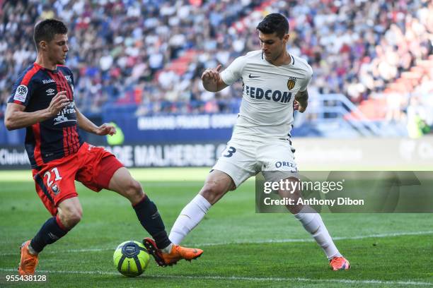 Frederic Guilbert of Caen and Pietro Pellegri of Monaco during the Ligue 1 match between SM Caen and AS Monaco at Stade Michel D'Ornano on May 6,...