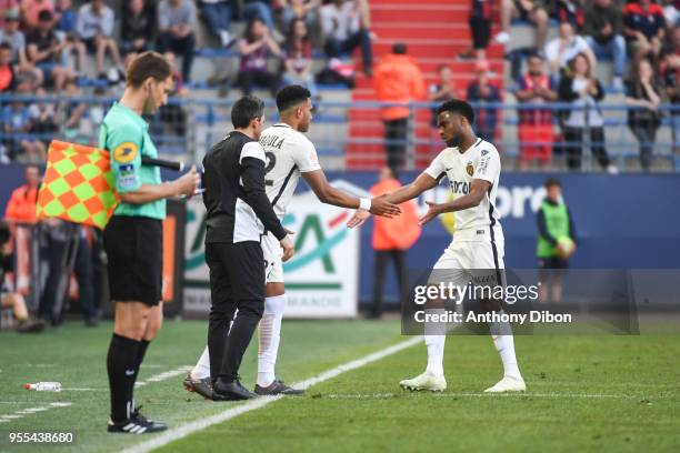 Thomas Lemar of Monaco is replaced by Jordi Mboula Queralt of Monaco during the Ligue 1 match between SM Caen and AS Monaco at Stade Michel D'Ornano...