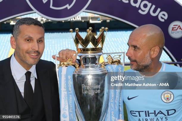 Khaldoon Al Mubarak the chairman of Manchester City and Pep Guardiola the head coach / manager of Manchester City with the Premier League trophy...