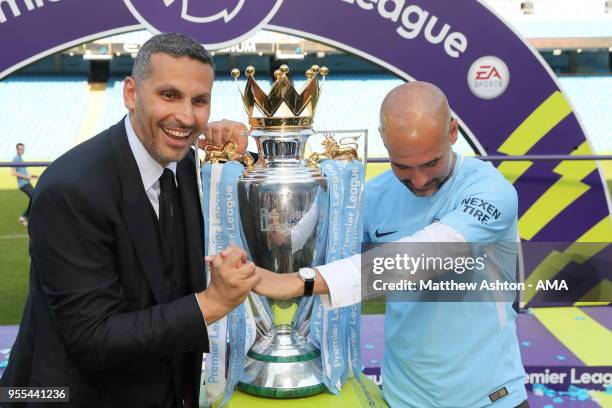 Khaldoon Al Mubarak the chairman of Manchester City and Pep Guardiola the head coach / manager of Manchester City with the Premier League trophy...