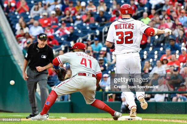 Washington Nationals catcher Matt Wieters beats out a a ninth inning single as the late throw comes to Philadelphia Phillies first baseman Carlos...