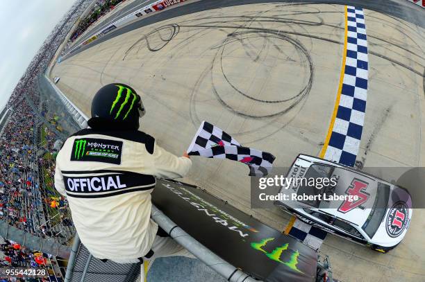 Kevin Harvick, driver of the Jimmy John's Ford, takes the chekered flag to win the Monster Energy NASCAR Cup Series AAA 400 Drive for Autism at Dover...