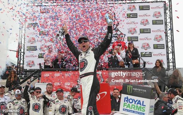 Kevin Harvick, driver of the Jimmy John's Ford, celebrates in victory lane after winning the Monster Energy NASCAR Cup Series AAA 400 Drive for...