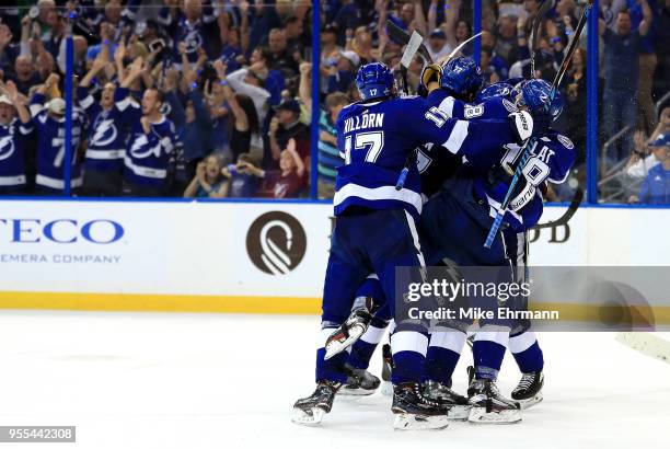 Anton Stralman of the Tampa Bay Lightning celebrates an empty net goal during Game Five of the Eastern Conference Second Round against the Boston...