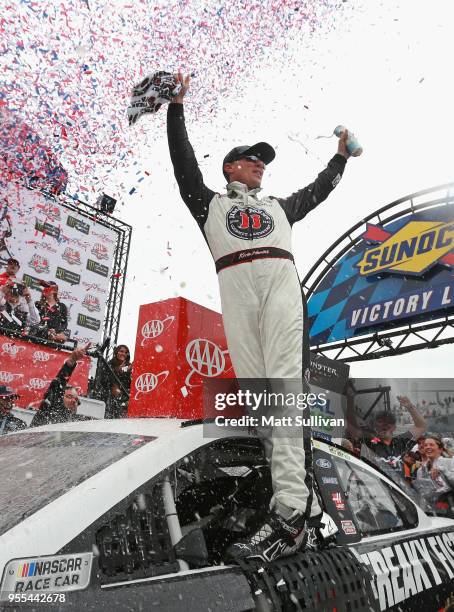 Kevin Harvick, driver of the Jimmy John's Ford, celebrates in victory lane after winning the Monster Energy NASCAR Cup Series AAA 400 Drive for...