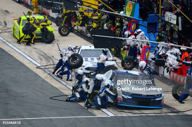 Kyle Larson, driver of the DC Solar Chevrolet, pits during the Monster Energy NASCAR Cup Series AAA 400 Drive for Autism at Dover International...