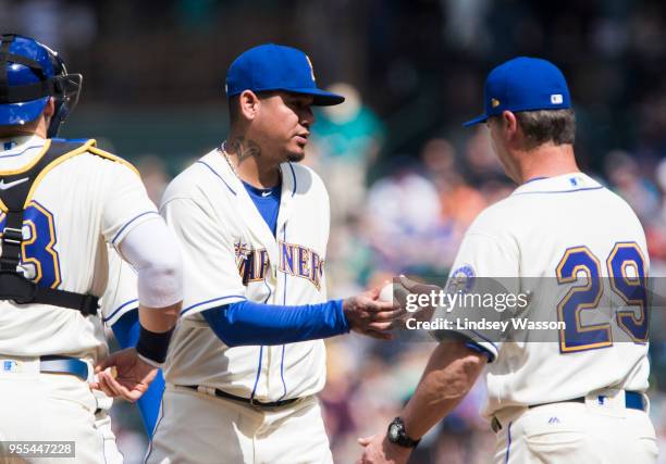 Felix Hernandez of the Seattle Mariners is taken out of the game by Seattle Mariners manager Scott Servais in the sixth inning at Safeco Field on May...