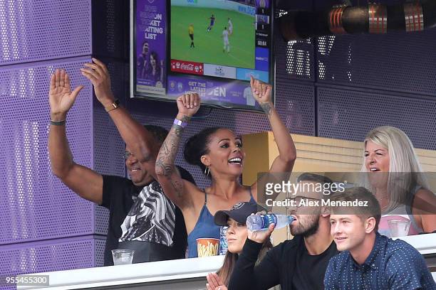 Soccer player Sydney Leroux cheers after her husband Dom Dwyer of Orlando City SC scored a goal against Real Salt Lake during a MLS soccer match at...