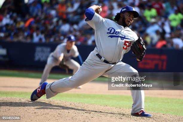 Pedro Baez of the Los Angeles Dodgers pitches during the game against the San Diego Padres at Estadio de Béisbol Monterrey on Sunday, May 6, 2018 in...