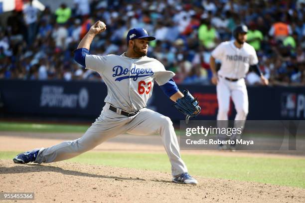 Yimi Garcia of the Los Angeles Dodgers pitches during the game against the San Diego Padres at Estadio de Béisbol Monterrey on Sunday, May 6, 2018 in...