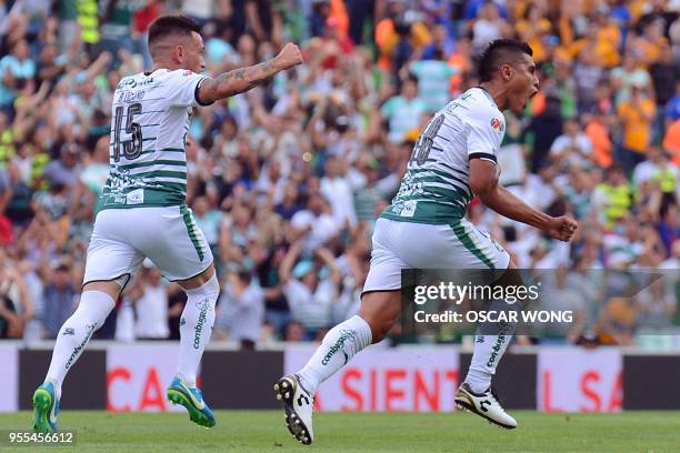 Santos' player Osvaldo Martinez celebrates after scoring against Tigres during their Mexican Clausura tournament second leg quarterfinal football...