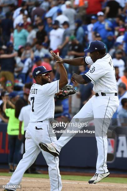 Members of the San Diego Padres celebrate after defeating the Los Angeles Dodgers at Estadio de Béisbol Monterrey on Sunday, May 6, 2018 in...