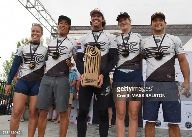 Members of the World Team, Paige Hareb of New Zealand; Kanoa Igarashi of Japan; Jordy Smith of South Africa; Bianca Buitendag of South Africa; and...