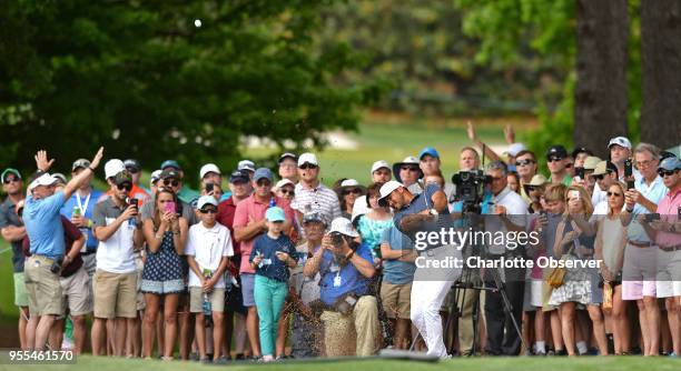 Golfer Jason Day hits from the rough along the seventh fairway during fourth round action of the Wells Fargo Championship on Sunday, May 6, 2018 at...