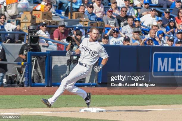 Center fielder Travis Jankowski of San Diego Padres gets to third base after hitting a triple in the seventh inning during the MLB game against the...