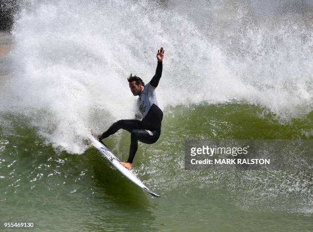 Jordy Smith of South Africa does a cutback as he leads the World Team to victory in the final of the WSL Founders' Cup of Surfing at the Kelly Slater...