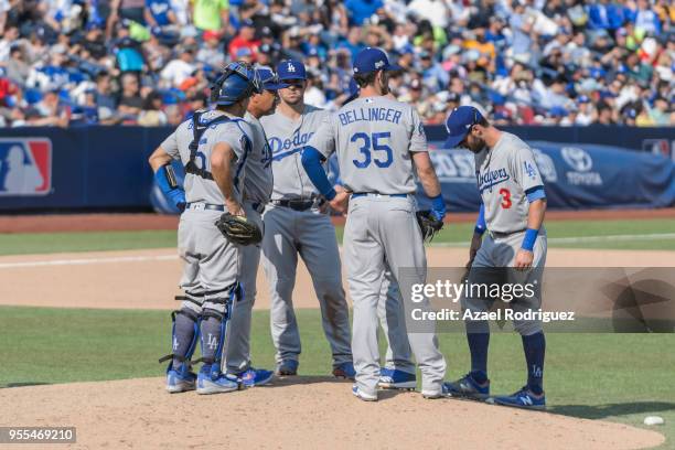 Players of Dodgers gather in the seventh inning during the MLB game against the San Diego Padres at Estadio de Beisbol Monterrey on May 6, 2018 in...