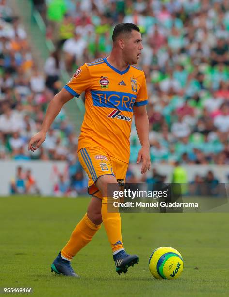 Israel Jimenez of Tigres drives the ball during the quarter finals second leg match between Santos Laguna and Tigres UANL as part of the Torneo...