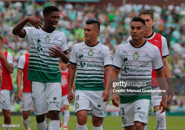 Djaniny Tavares, Osvaldo Martinez and Jose Vazquez of Santos leave the field during the quarter finals second leg match between Santos Laguna and...