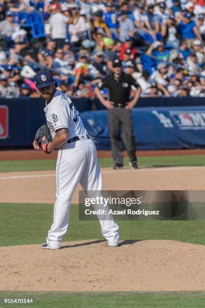 Relief pitcher Kirby Yates of San Diego Padres looks at second base in the eight inning during the MLB game against the Los Angeles Dodgers at...